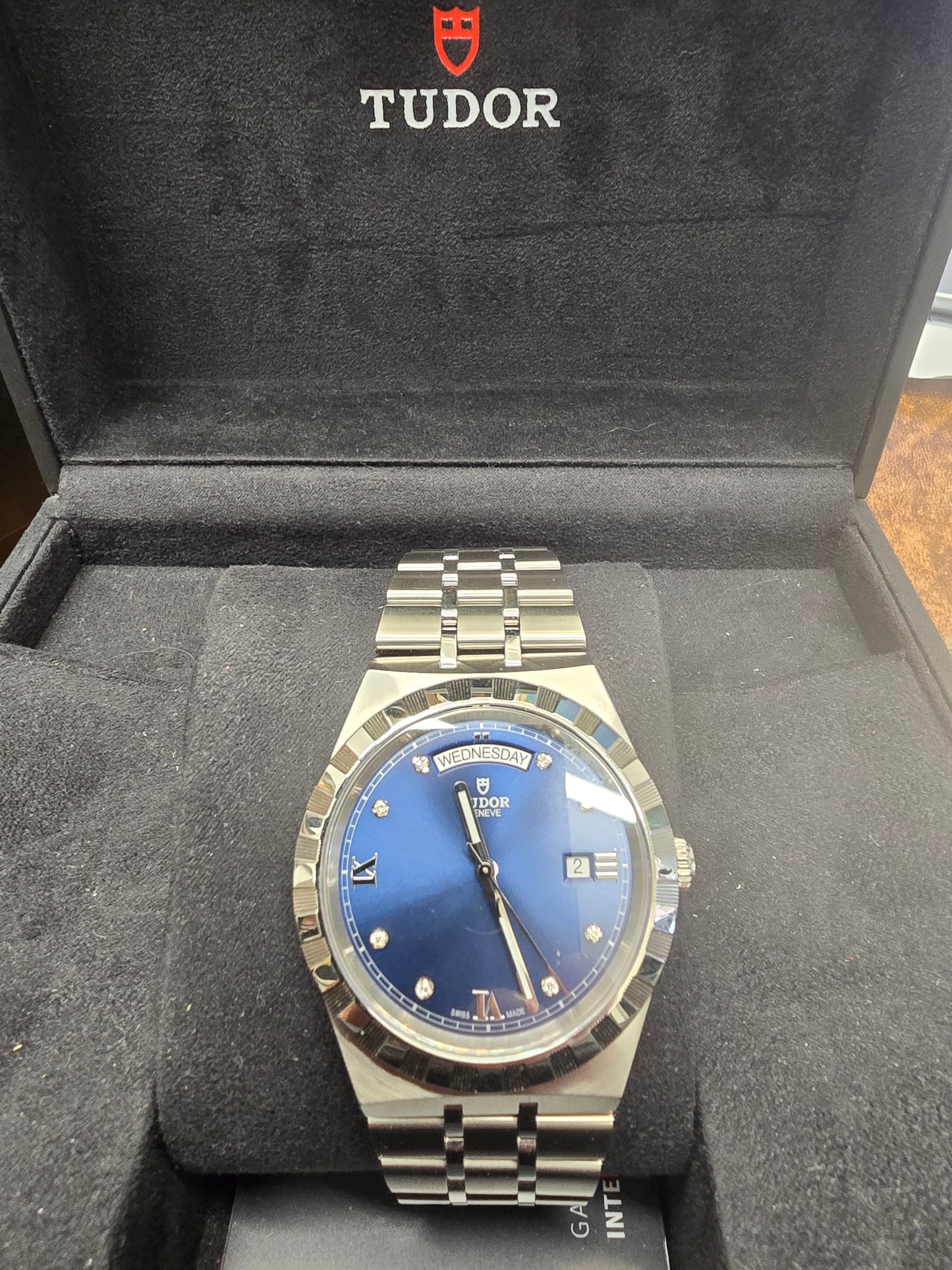 Reeves and Sons Tutor Royal Day Date Diamond Watch Model 28600 with gold case and silver dial, 2021 design.
