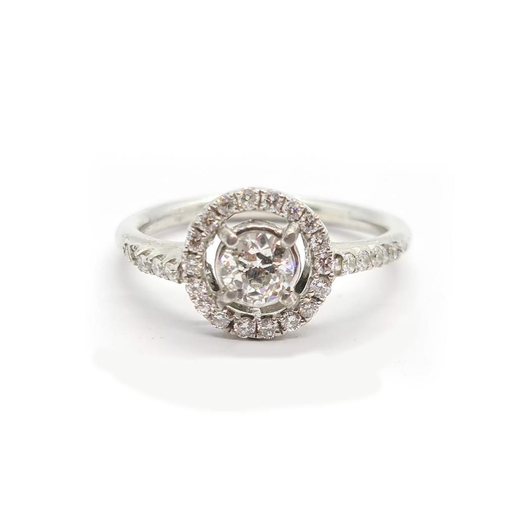 https://shared1.ad-lister.co.uk/UserImages/f9858451-6400-46df-9300-45516e64c4e1/Img/Diamondrings/18ct-080ct-diamond-halo-ring-p0.jpg