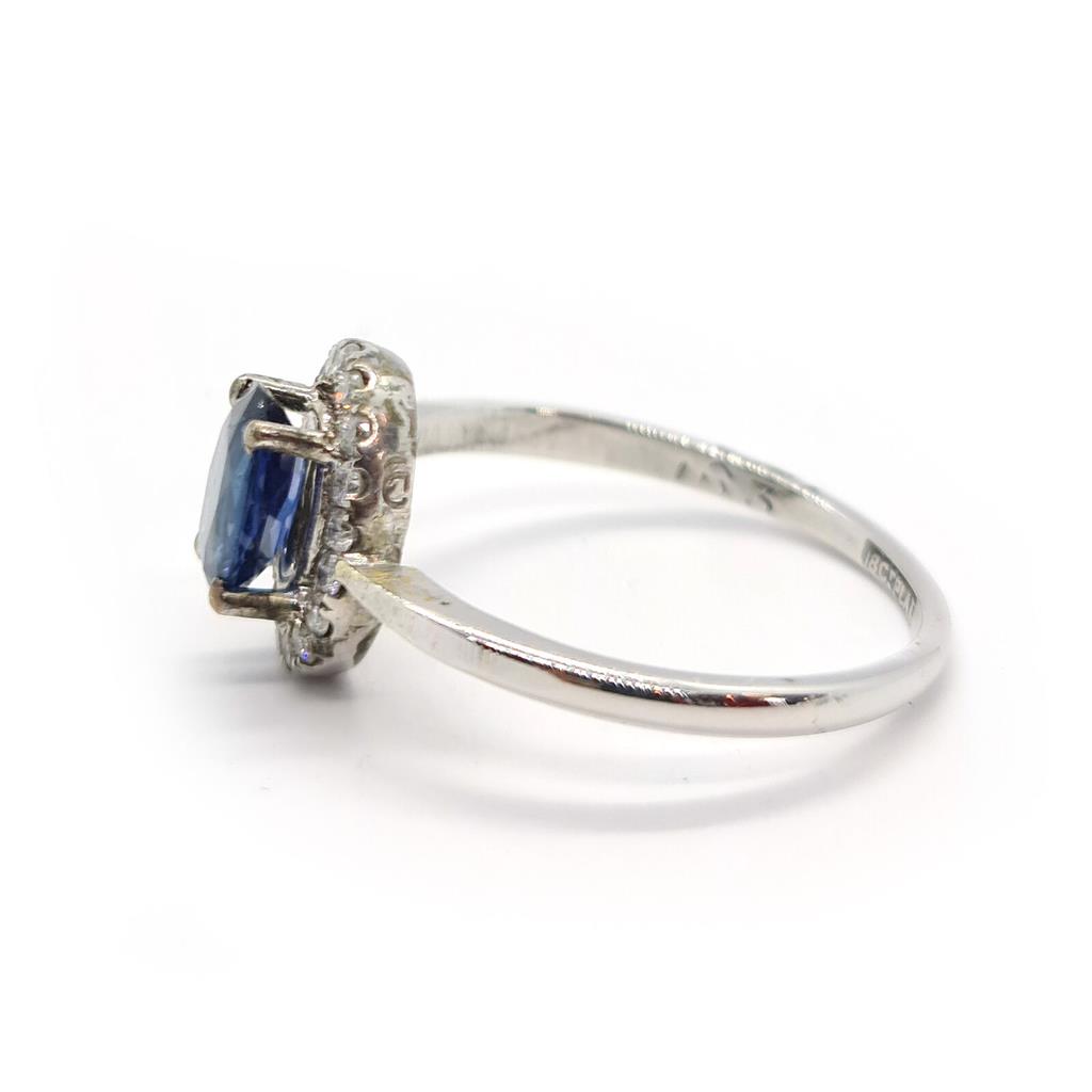 https://shared1.ad-lister.co.uk/UserImages/f9858451-6400-46df-9300-45516e64c4e1/Img/Diamondrings/18ct-sapphire--diamond-ring-p4.jpg