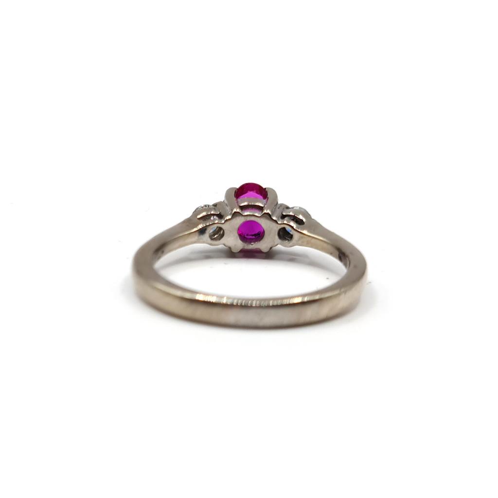 https://shared1.ad-lister.co.uk/UserImages/f9858451-6400-46df-9300-45516e64c4e1/Img/Diamondrings/18ct-white-gold-055-carat-ruby--020-carat-diamond-ring-p1.jpg