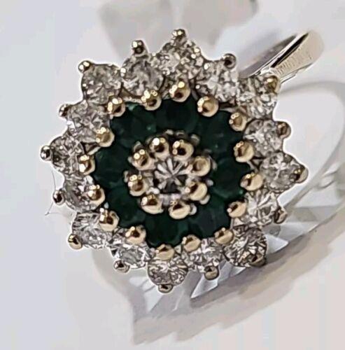 https://shared1.ad-lister.co.uk/UserImages/f9858451-6400-46df-9300-45516e64c4e1/Img/Diamondrings/18ct-white-gold-12-carat-emerald--100-carat-diamond-ring-p0.jpg