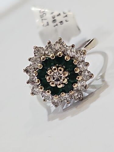 https://shared1.ad-lister.co.uk/UserImages/f9858451-6400-46df-9300-45516e64c4e1/Img/Diamondrings/18ct-white-gold-12-carat-emerald--100-carat-diamond-ring-p1.jpg