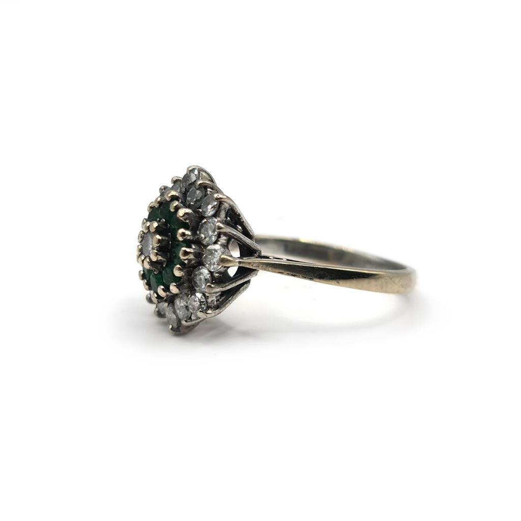 https://shared1.ad-lister.co.uk/UserImages/f9858451-6400-46df-9300-45516e64c4e1/Img/Diamondrings/18ct-white-gold-12-carat-emerald--100-carat-diamond-ring-p6.jpg