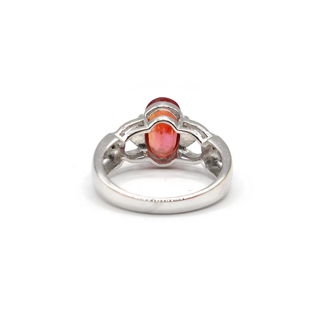 https://shared1.ad-lister.co.uk/UserImages/f9858451-6400-46df-9300-45516e64c4e1/Img/Diamondrings/18ct-white-gold-220-carat-orange-garnet--diamond-ring-p2.jpg