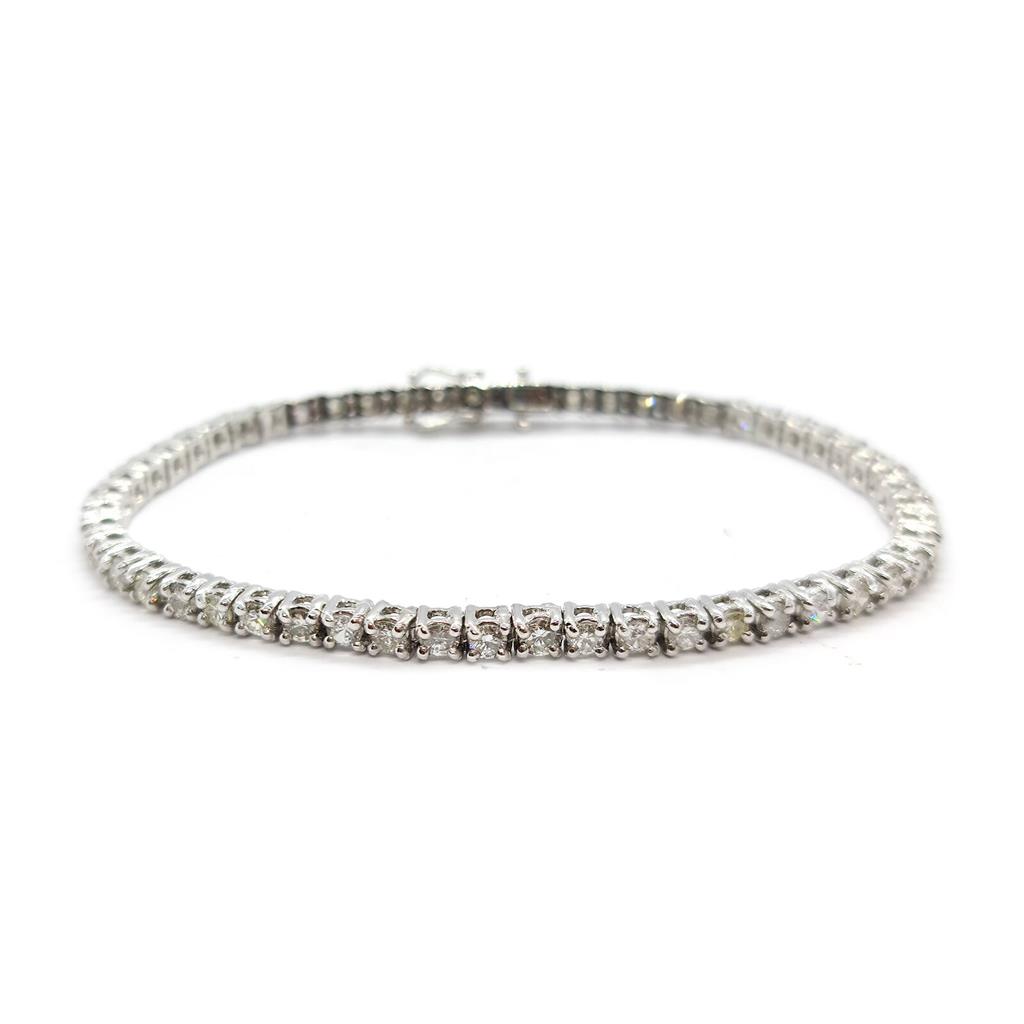 https://shared1.ad-lister.co.uk/UserImages/f9858451-6400-46df-9300-45516e64c4e1/Img/Bracelets/18ct-white-gold-385-crt-diamond-bracelet-p0.jpg