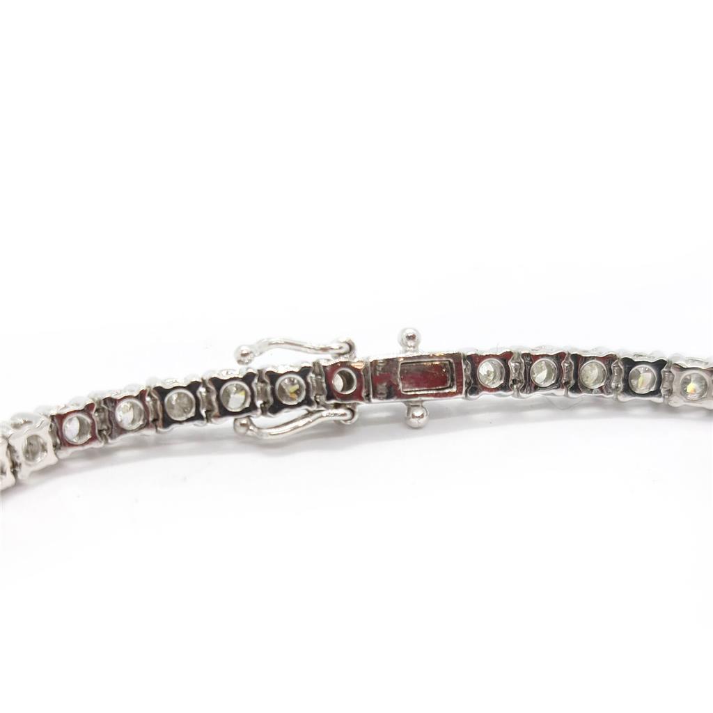 https://shared1.ad-lister.co.uk/UserImages/f9858451-6400-46df-9300-45516e64c4e1/Img/Bracelets/18ct-white-gold-385-crt-diamond-bracelet-p1.jpg