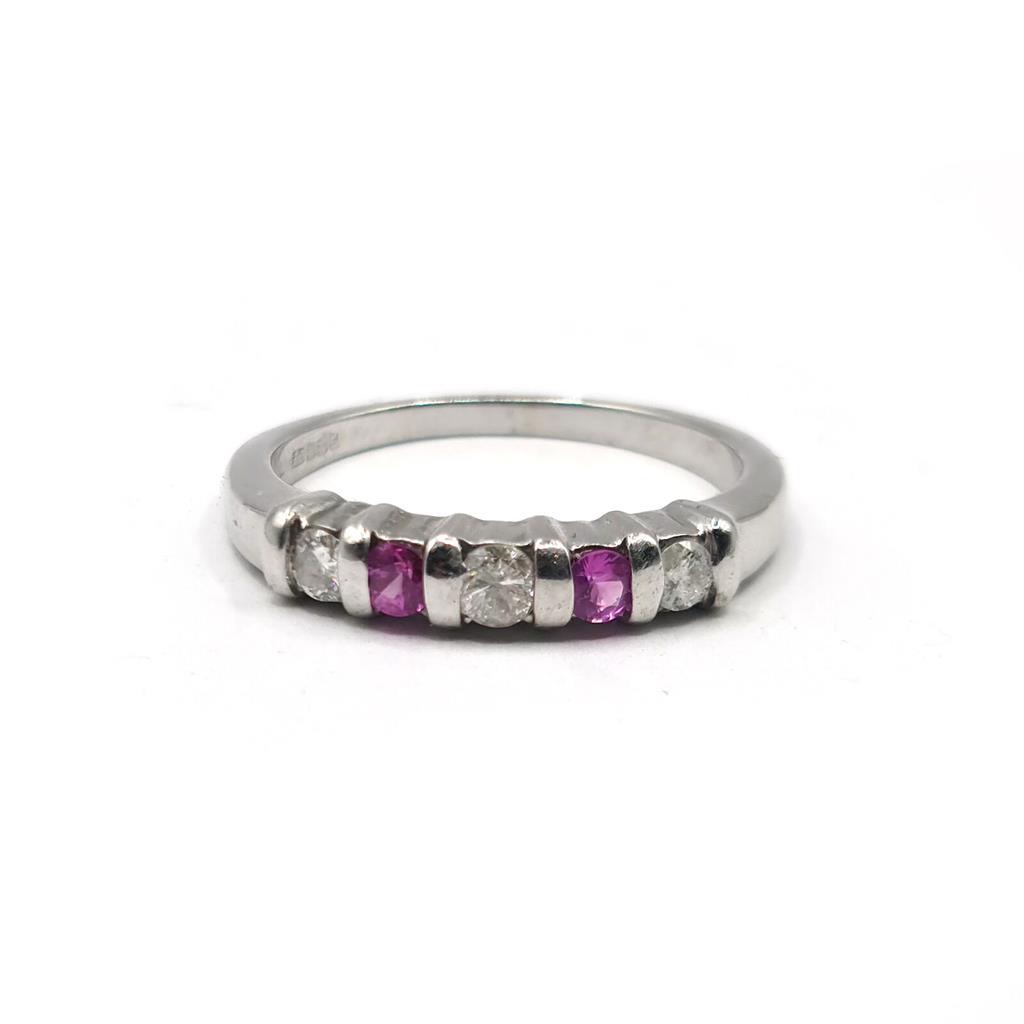 https://shared1.ad-lister.co.uk/UserImages/f9858451-6400-46df-9300-45516e64c4e1/Img/Diamondrings/18ct-white-gold-pink-sapphire--diamond-ring-p0.jpg