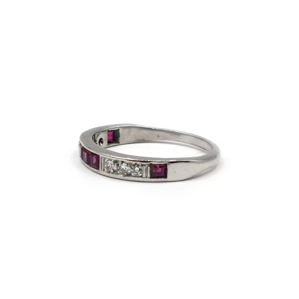 https://shared1.ad-lister.co.uk/UserImages/f9858451-6400-46df-9300-45516e64c4e1/Img/Diamondrings/18ct-white-gold-ruby--diamond-half-eternity-ring-p3.jpg