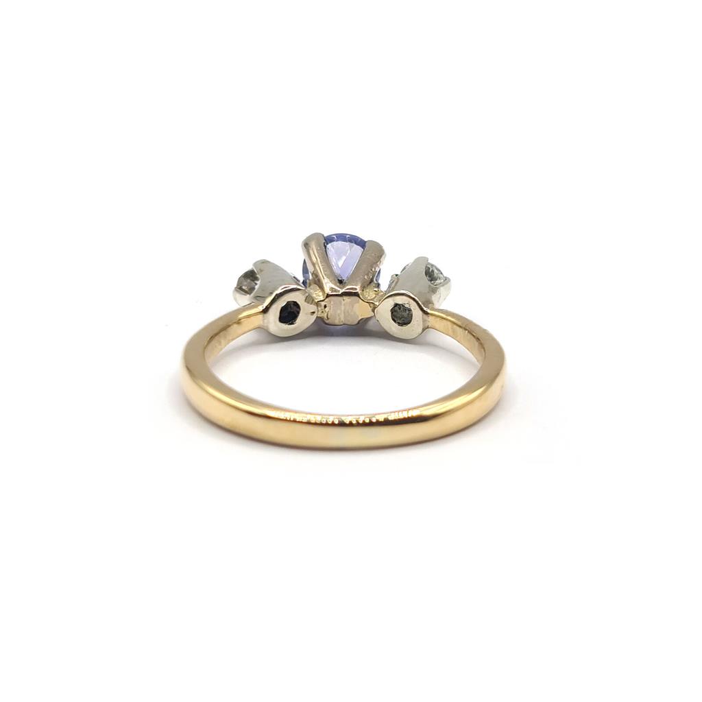 https://shared1.ad-lister.co.uk/UserImages/f9858451-6400-46df-9300-45516e64c4e1/Img/Diamondrings/18ct-yellow-gold-040-carat-tanzanite--020-carat-diamond-ring-p3.jpg