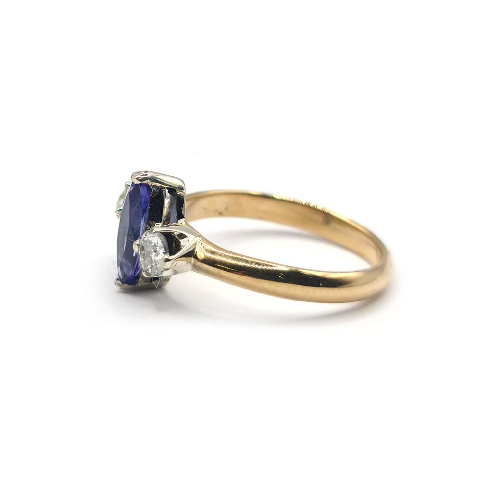 https://shared1.ad-lister.co.uk/UserImages/f9858451-6400-46df-9300-45516e64c4e1/Img/Diamondrings/18ct-yellow-gold-050-carat-tanzanite--030-carat-diamond-ring-p2.jpg