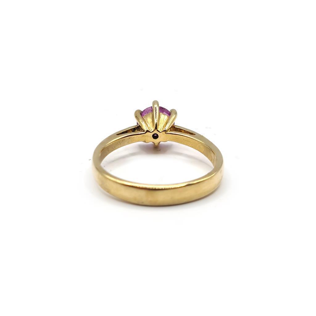 https://shared1.ad-lister.co.uk/UserImages/f9858451-6400-46df-9300-45516e64c4e1/Img/GoldRings/18ct-yellow-gold-103-carat-pink-sapphire-ring-p1.jpg