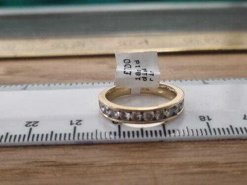 https://shared1.ad-lister.co.uk/UserImages/f9858451-6400-46df-9300-45516e64c4e1/Img/Diamondrings/18ct-yellow-gold-34-carat-diamond-half-eternity-ring-Size-Q-p7.jpg