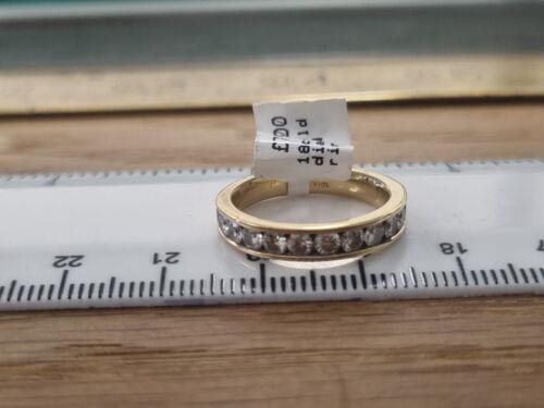 https://shared1.ad-lister.co.uk/UserImages/f9858451-6400-46df-9300-45516e64c4e1/Img/Diamondrings/18ct-yellow-gold-34-carat-diamond-half-eternity-ring-Size-Q-p8.jpg