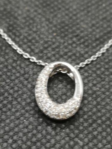 https://shared1.ad-lister.co.uk/UserImages/f9858451-6400-46df-9300-45516e64c4e1/Img/Chains/9ct-White-Gold-Chain-with-a-white-gold--Diamond-Pendant-p0.jpg