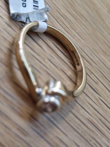 https://shared1.ad-lister.co.uk/UserImages/f9858451-6400-46df-9300-45516e64c4e1/Img/GoldRings/9ct-Yellow-Gold-diamond-solitaire-ring-Ring-size-K-p10.jpg