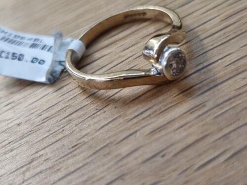 https://shared1.ad-lister.co.uk/UserImages/f9858451-6400-46df-9300-45516e64c4e1/Img/GoldRings/9ct-Yellow-Gold-diamond-solitaire-ring-Ring-size-K-p7.jpg
