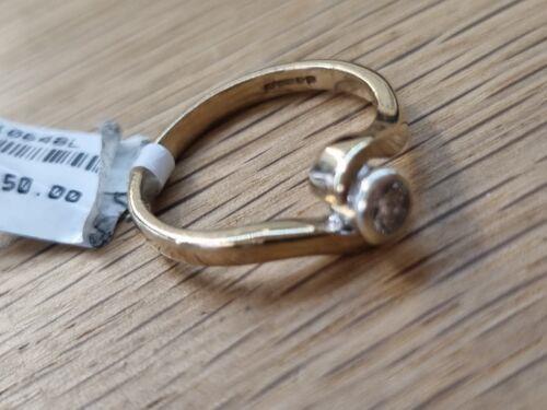 https://shared1.ad-lister.co.uk/UserImages/f9858451-6400-46df-9300-45516e64c4e1/Img/GoldRings/9ct-Yellow-Gold-diamond-solitaire-ring-Ring-size-K-p8.jpg