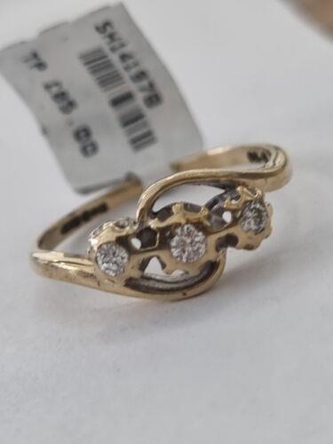 https://shared1.ad-lister.co.uk/UserImages/f9858451-6400-46df-9300-45516e64c4e1/Img/Diamondrings/9ct-yellow-gold-three-diamond-ring-Size-M-p6.jpg