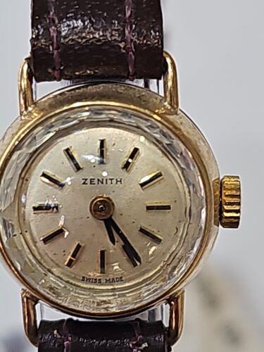 https://shared1.ad-lister.co.uk/UserImages/f9858451-6400-46df-9300-45516e64c4e1/Img/Watches/Ladies-9ct-yellow-Gold-Zenith-Watch-p1.jpg