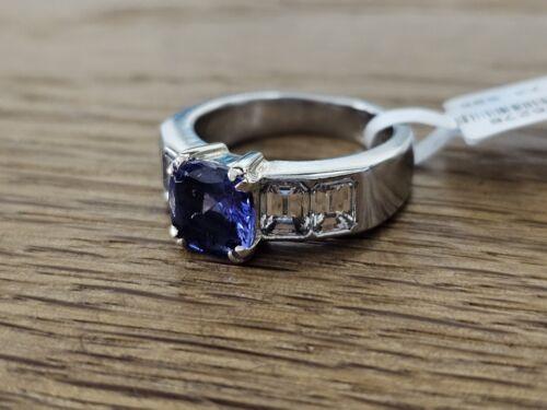https://shared1.ad-lister.co.uk/UserImages/f9858451-6400-46df-9300-45516e64c4e1/Img/Diamondrings/Platinum-179-carat-tanzanite--160-carat-diamond-ring-p12.jpg