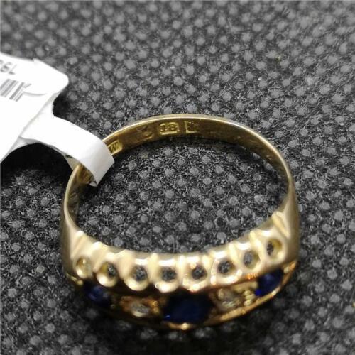 https://shared1.ad-lister.co.uk/UserImages/f9858451-6400-46df-9300-45516e64c4e1/Img/Diamondrings/Vintage-18ct-yellow-gold-sapphire-and-diamond-ring-p4.jpg
