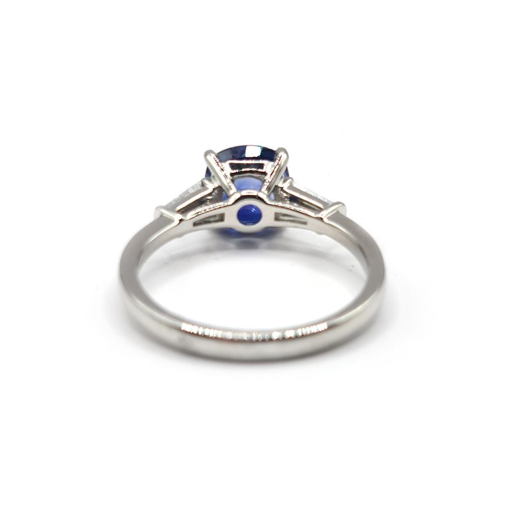 https://shared1.ad-lister.co.uk/UserImages/f9858451-6400-46df-9300-45516e64c4e1/Img/Diamondrings/platinum-185-carat-sapphire--020-carat-diamond-ring-p2.jpg